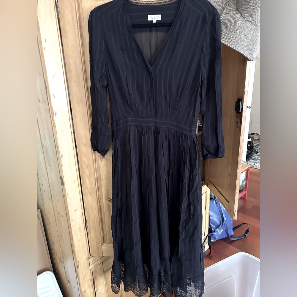 Gorgeous and elegant dress never worn . Bought in Paris